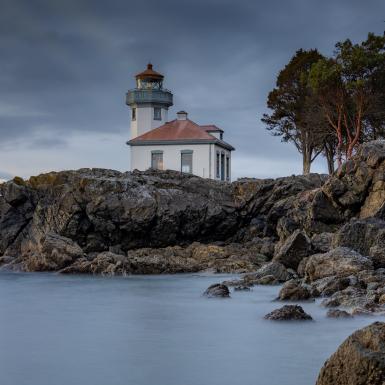 A lighthouse on ocean cliffs