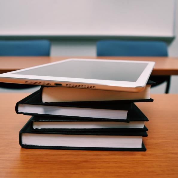 Desk with books and tablet